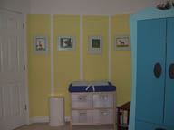 baby room with pictures