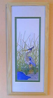 rocking chair with heron picture